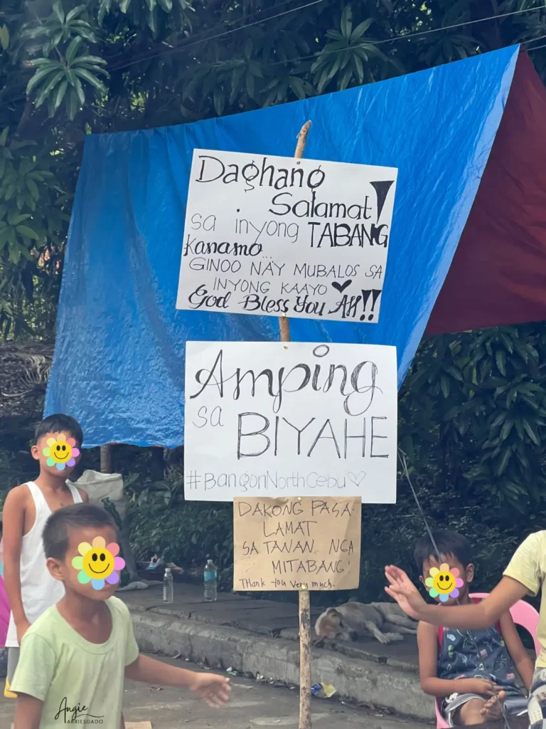 Kids thanking volunteers for helping North Cebu earthquake victims