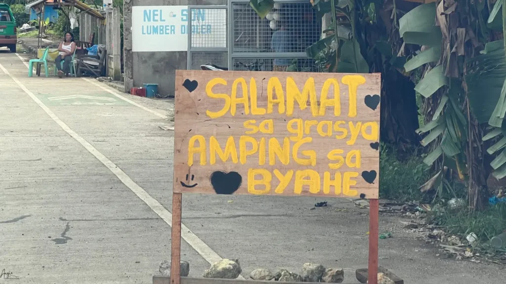 Roadside signs thanking volunteers for helping North Cebu earthquake survivors