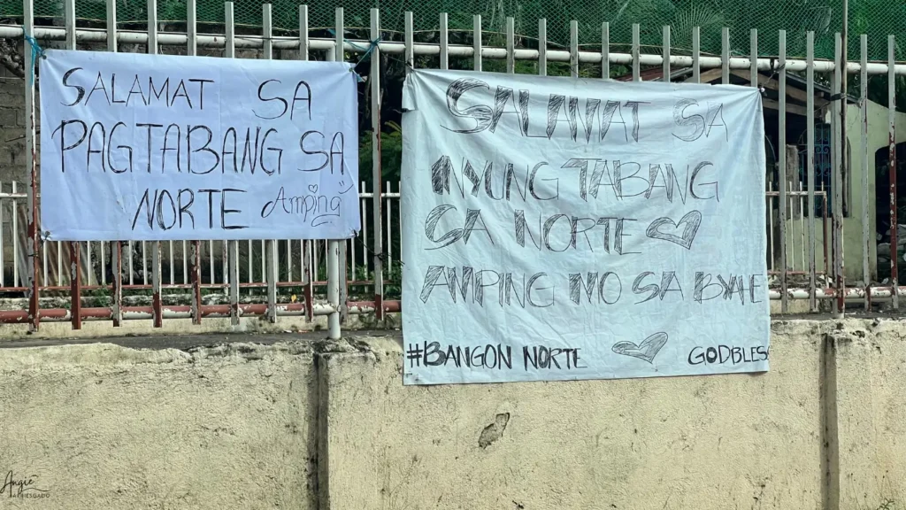 Roadside sign thanking volunteers for helping North Cebu earthquake survivors